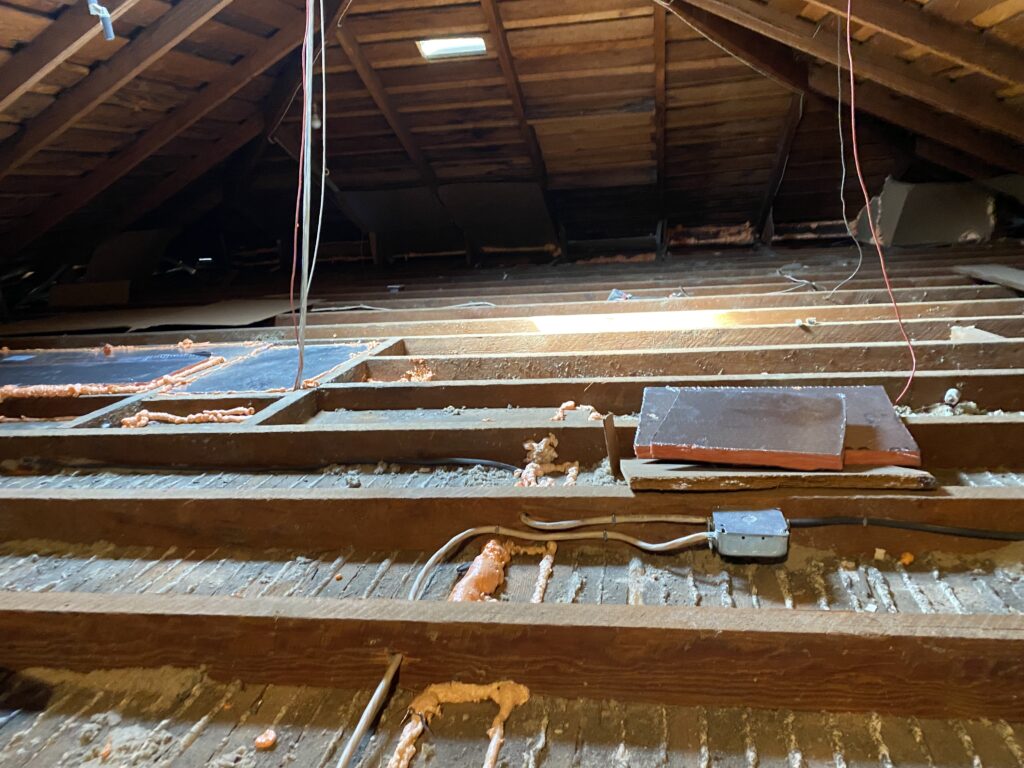 Air sealing the attic before installing heat pump blower for ducted system.